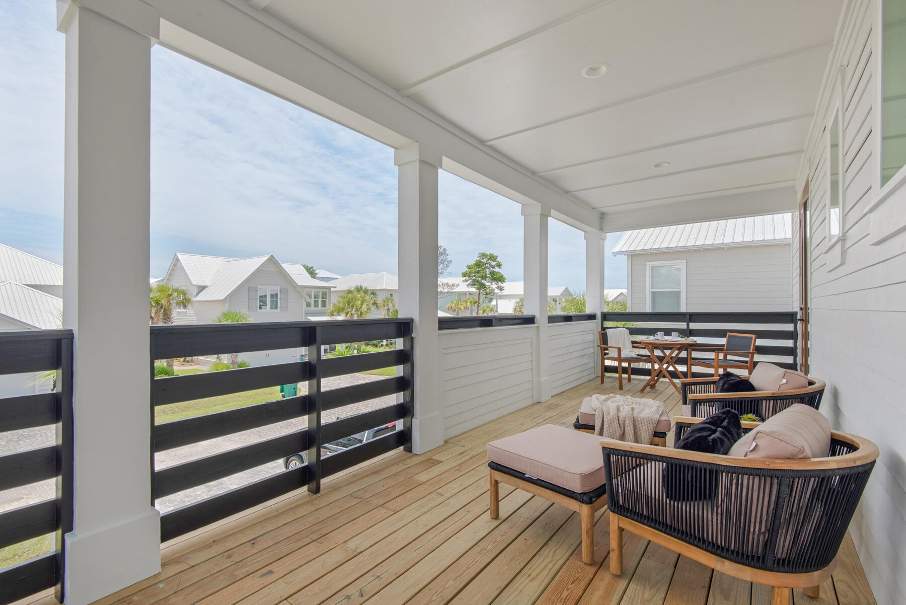 22 Ruth Street Miramar Beach, FL 32550 - Photo 53 of 66 a living room with furniture and a wooden floor
