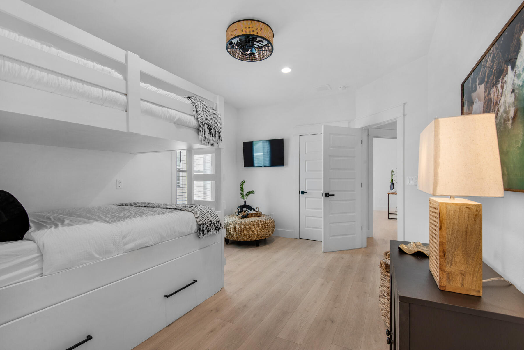 22 Ruth Street Miramar Beach, FL 32550 - Photo 55 of 66 a bedroom with a bed and wooden floor