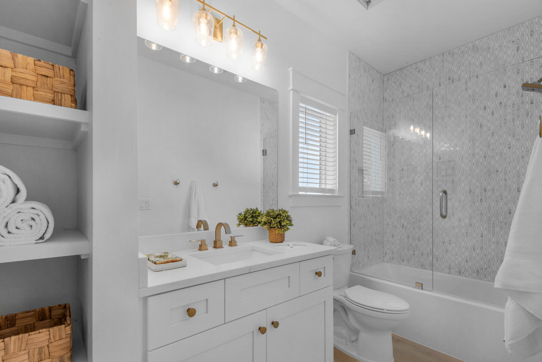 22 Ruth Street Miramar Beach, FL 32550 - Photo 57 of 66 a bathroom with a sink a toilet and shower