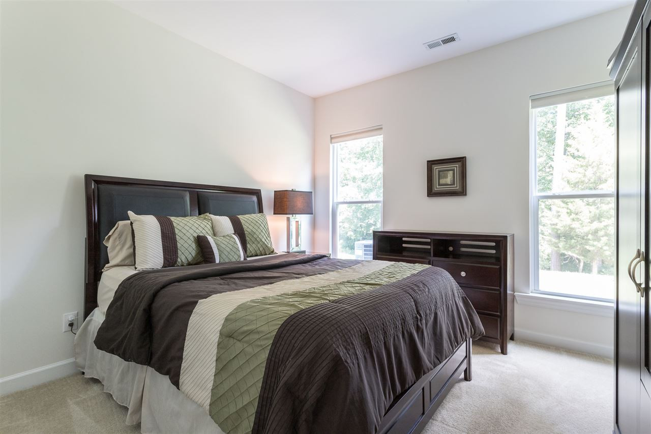 448 Jerome Road Durham, NC 27713 - Photo 10 of 23 Downstairs Secondary Bedroom with Full Bath Downstairs Secondary Bedroom