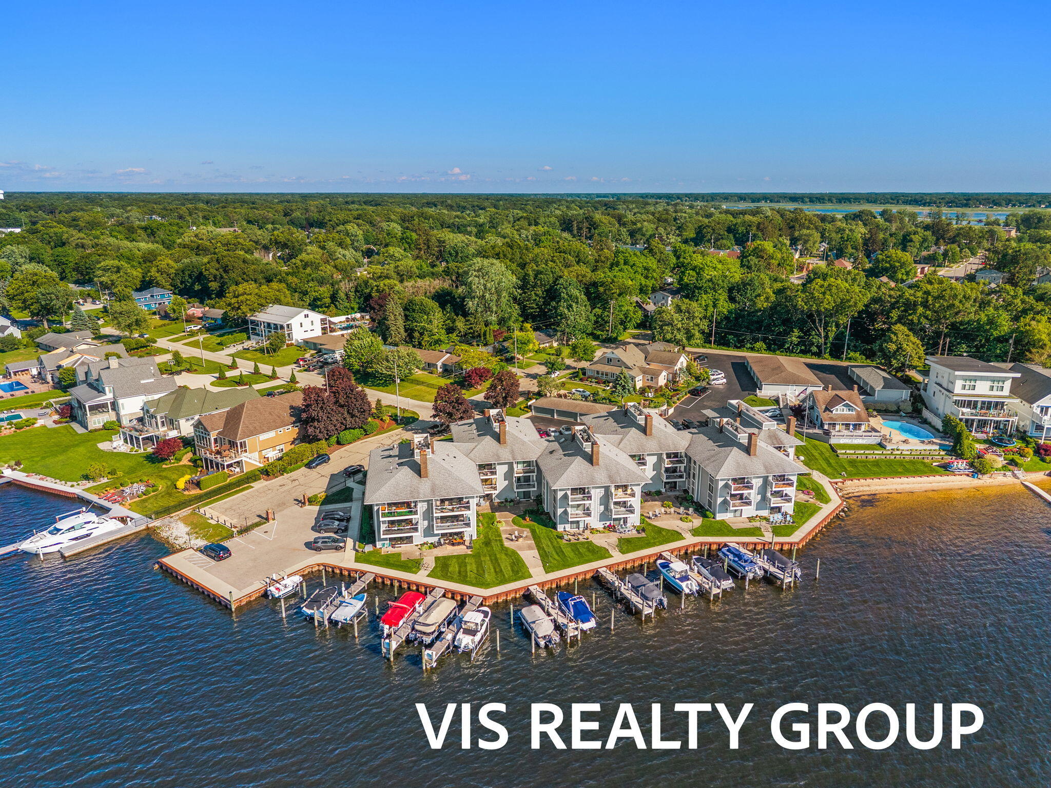 400 Lakeview Court, Unit 8B Spring Lake, MI 49456 - Photo 1 of 64 16-web-or-mls-DJI_20260618181616_0293_D