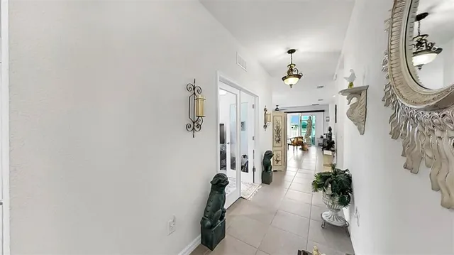 a view of entryway with livingroom