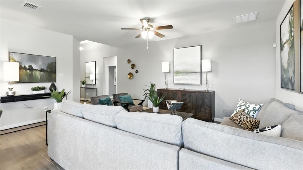 657 Harvey Street Grandview, TX 76050 - Photo 14 of 40 a living room with furniture and a large window