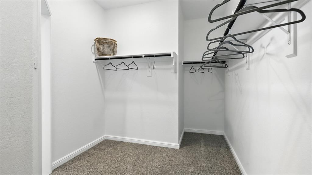 657 Harvey Street Grandview, TX 76050 - Photo 21 of 40 a view of a hallway with a window
