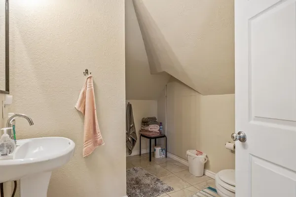 a bathroom with a sink and a toilet