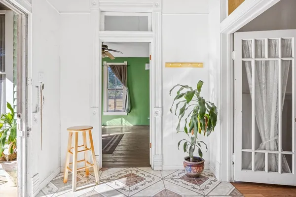 a vase of flowers sitting on a table