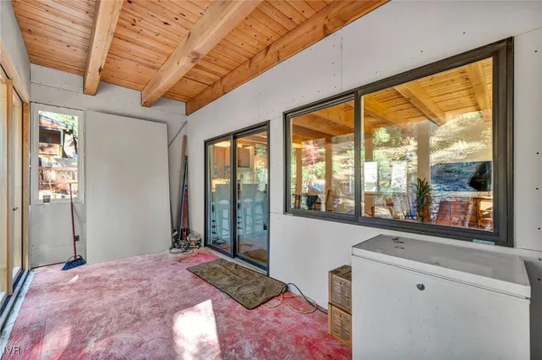 a bedroom with a bed and furniture