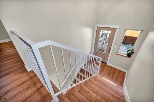 a view of entryway with wooden floor