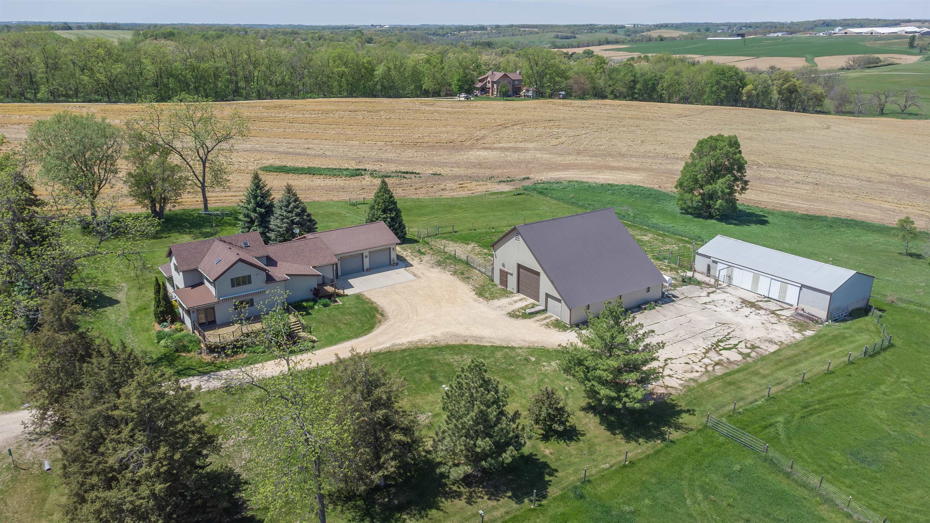 25303 Spring Valley Road Shannon, IL 61078 - Photo 3 of 22 an aerial view of multiple house with outdoor space