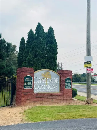 a view of a street with red sign board
