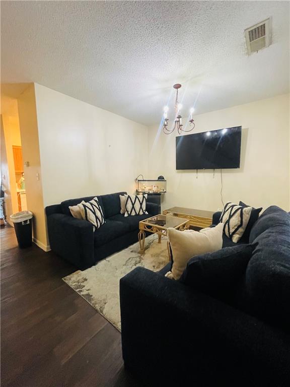 3607 Ginnis Road, Unit 3 Atlanta, GA 30331 - Photo 5 of 11 a living room with furniture and a flat screen tv