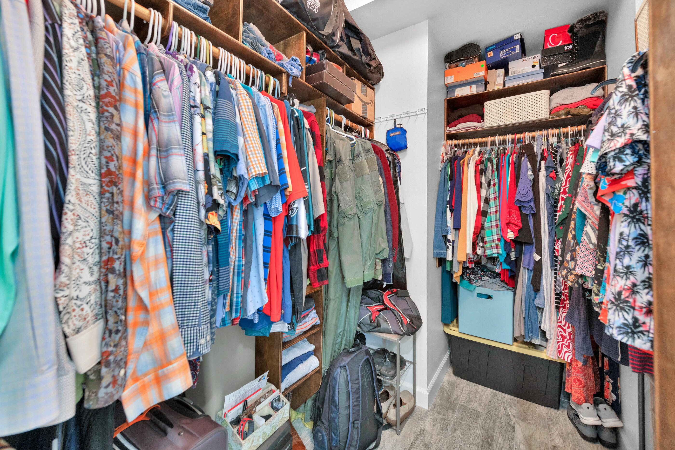 4475 Woodbridge Road Niceville, FL 32578 - Photo 27 of 49 a view of walk in closet with clothes