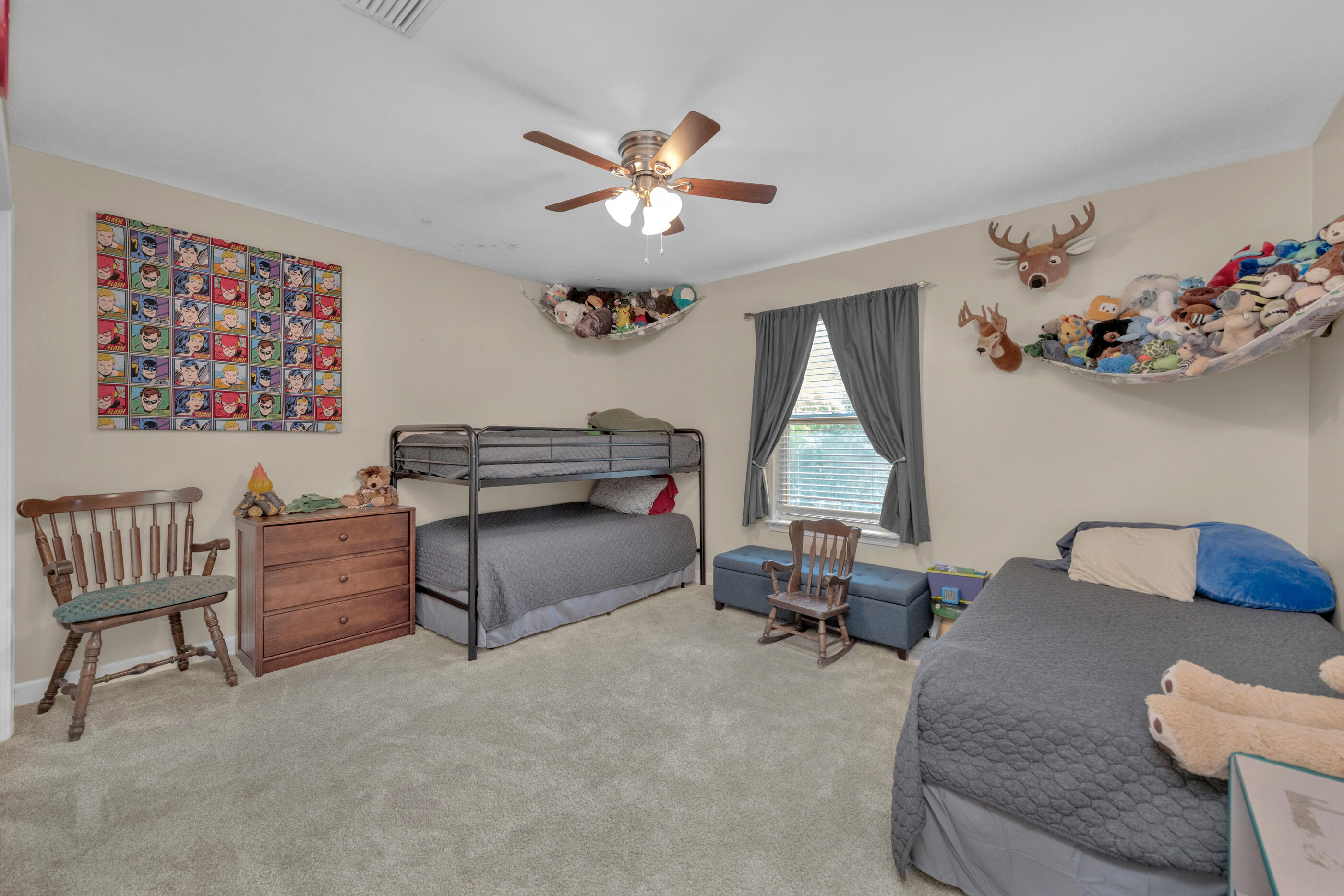 4475 Woodbridge Road Niceville, FL 32578 - Photo 34 of 49 a living room with furniture and a large window