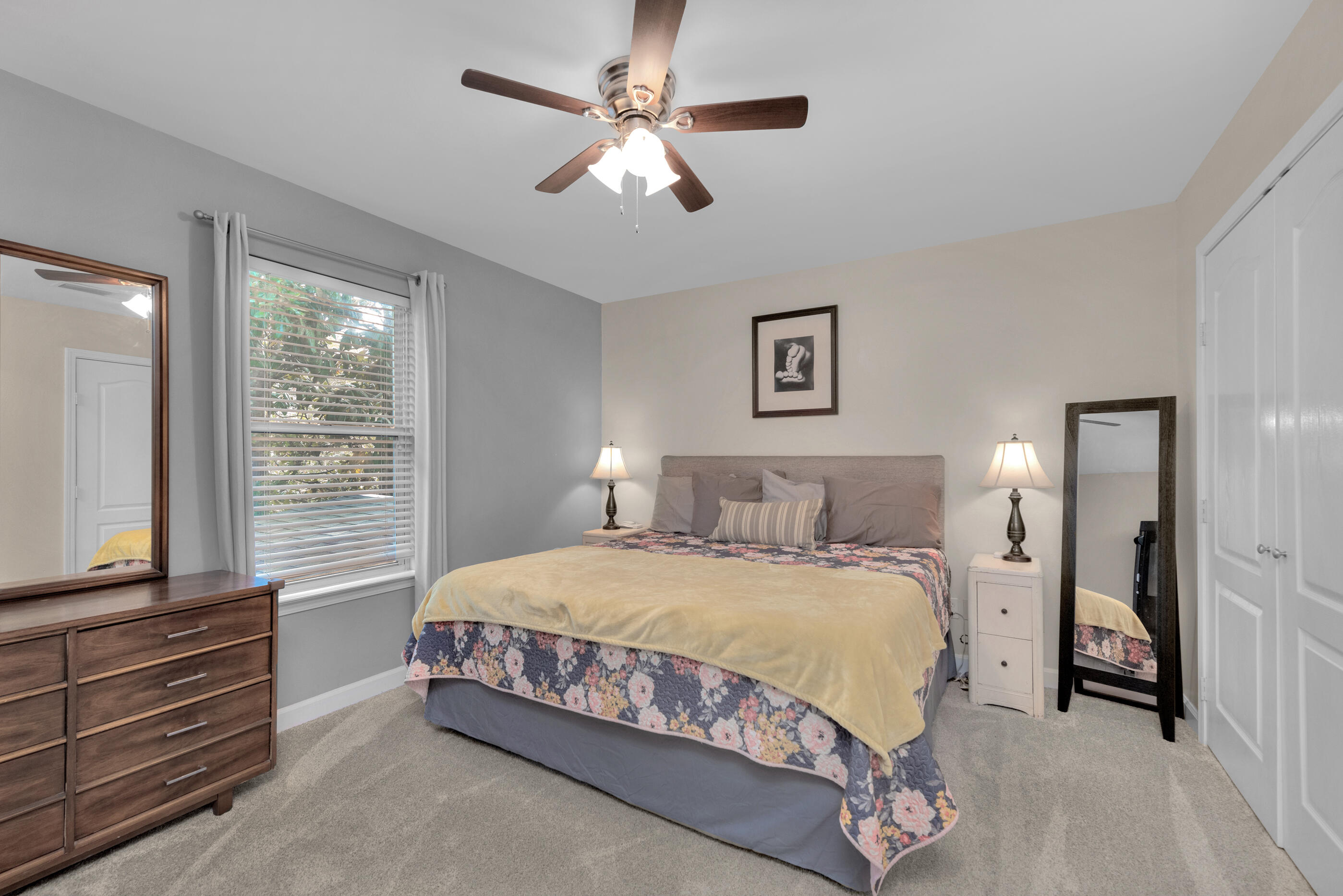 4475 Woodbridge Road Niceville, FL 32578 - Photo 36 of 49 a bedroom with a bed and a window