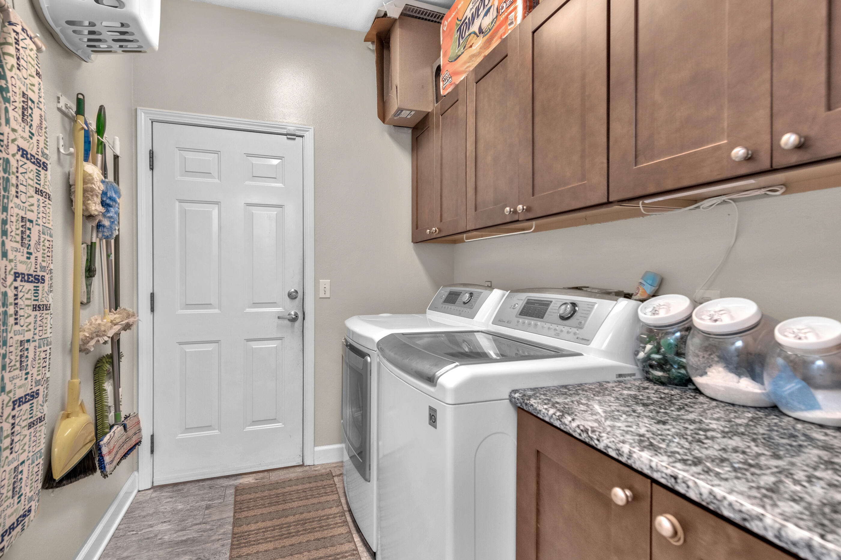 4475 Woodbridge Road Niceville, FL 32578 - Photo 38 of 49 a kitchen with a sink and cabinets