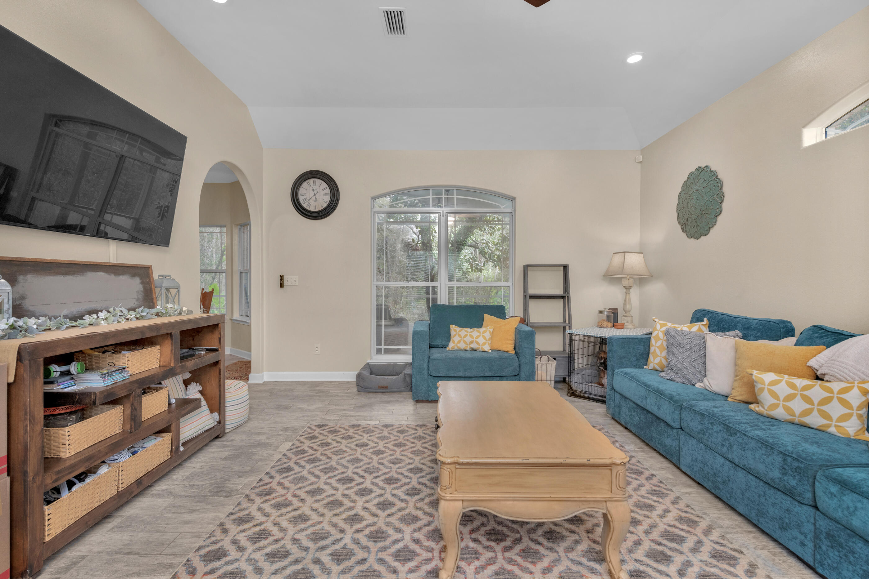 4475 Woodbridge Road Niceville, FL 32578 - Photo 6 of 49 a living room with furniture and a large window