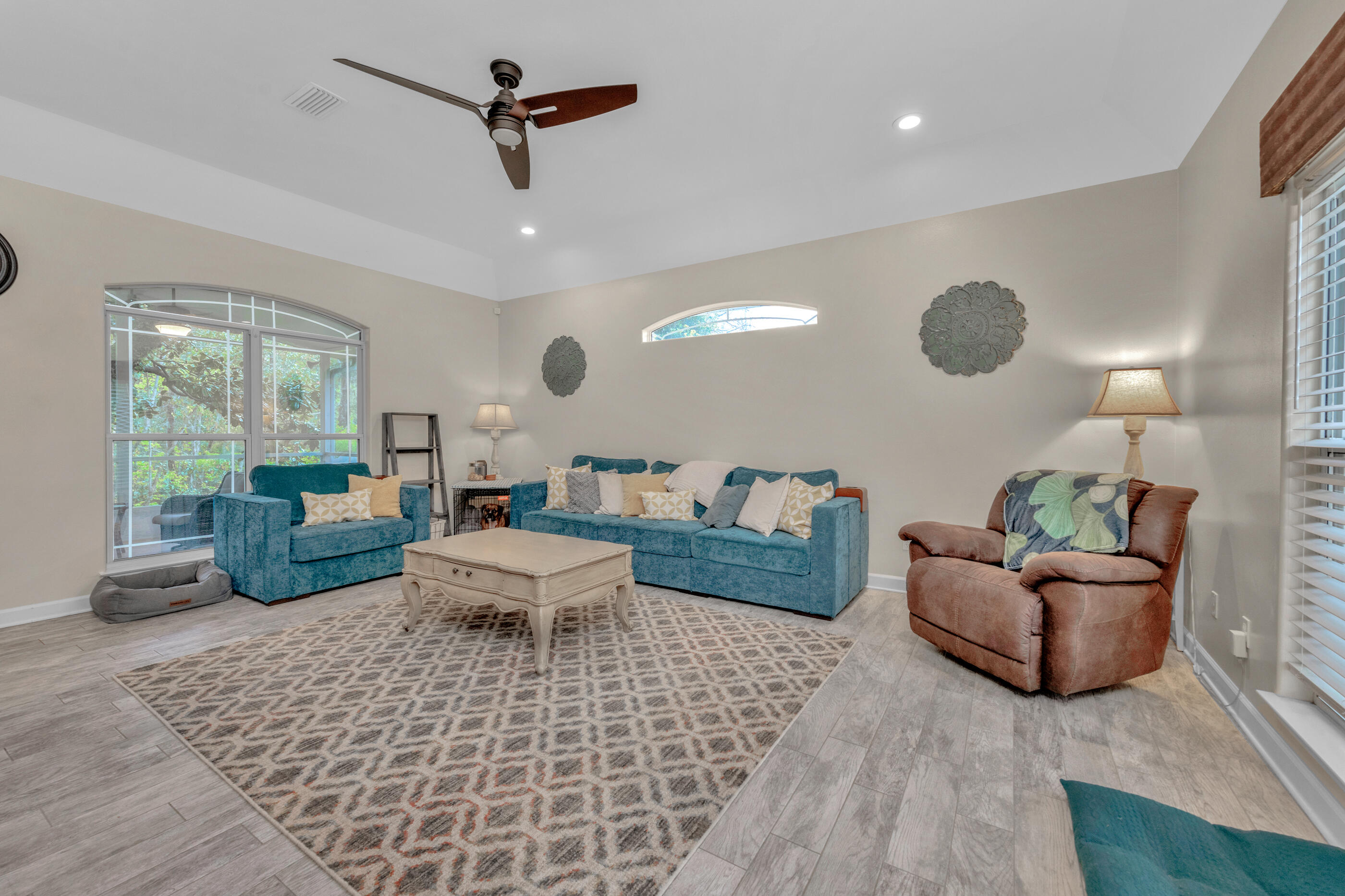 4475 Woodbridge Road Niceville, FL 32578 - Photo 7 of 49 a living room with furniture and a large window