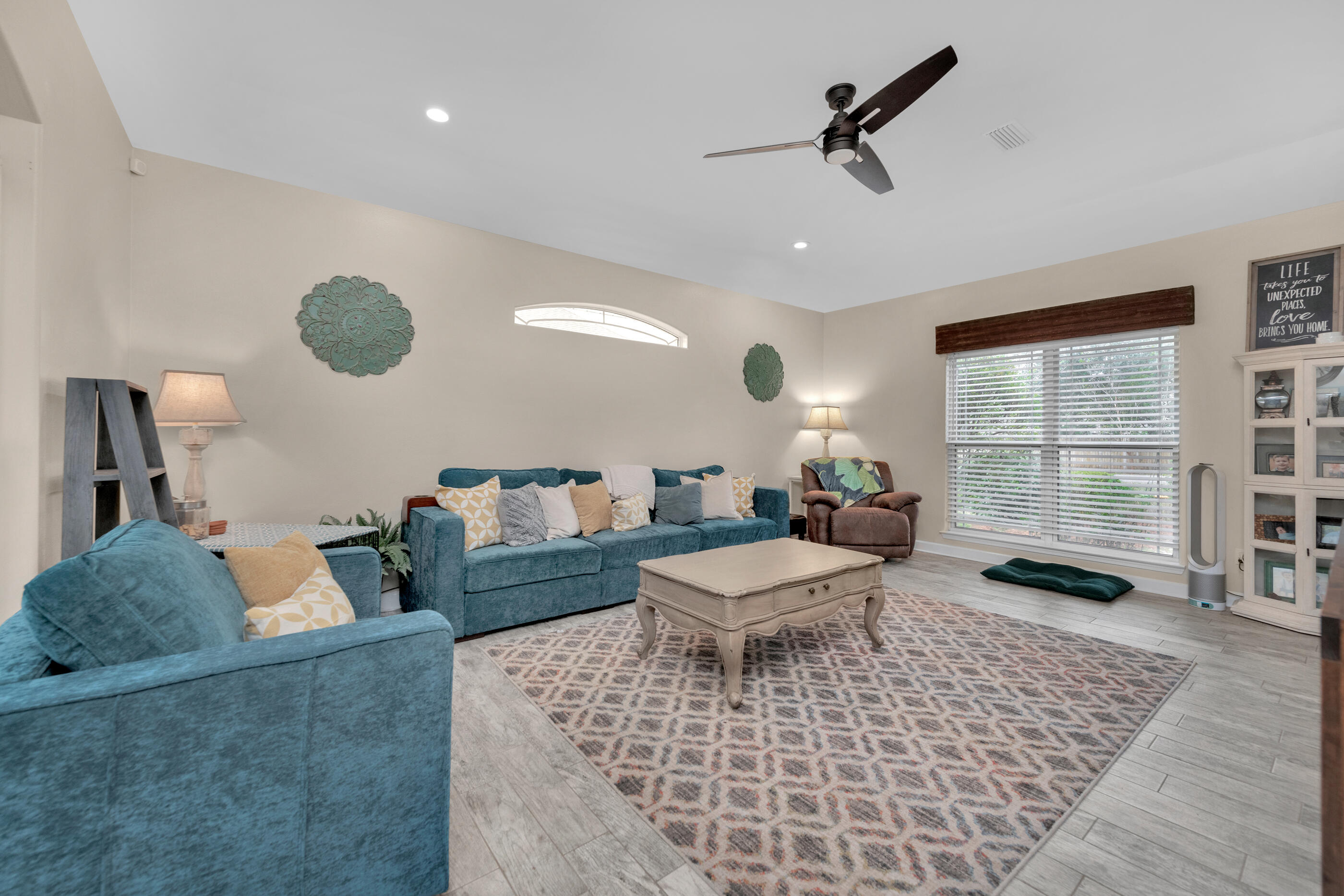 4475 Woodbridge Road Niceville, FL 32578 - Photo 8 of 49 a living room with furniture a window and a table