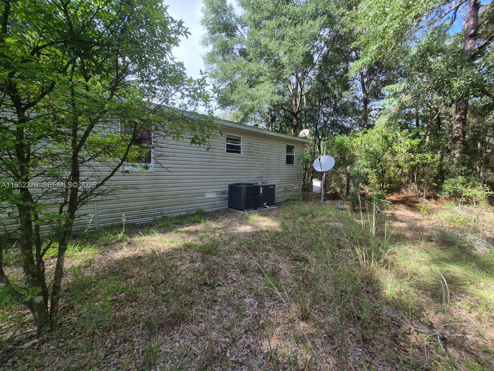 2390- Northwest 65th Street Bell, FL 32619 - Photo 5 of 10