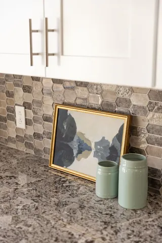 a bedroom with bed and a window