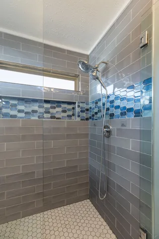 a view of a pathway with a yard