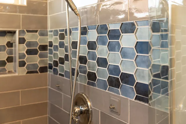 a view of a big house with a big yard and large trees