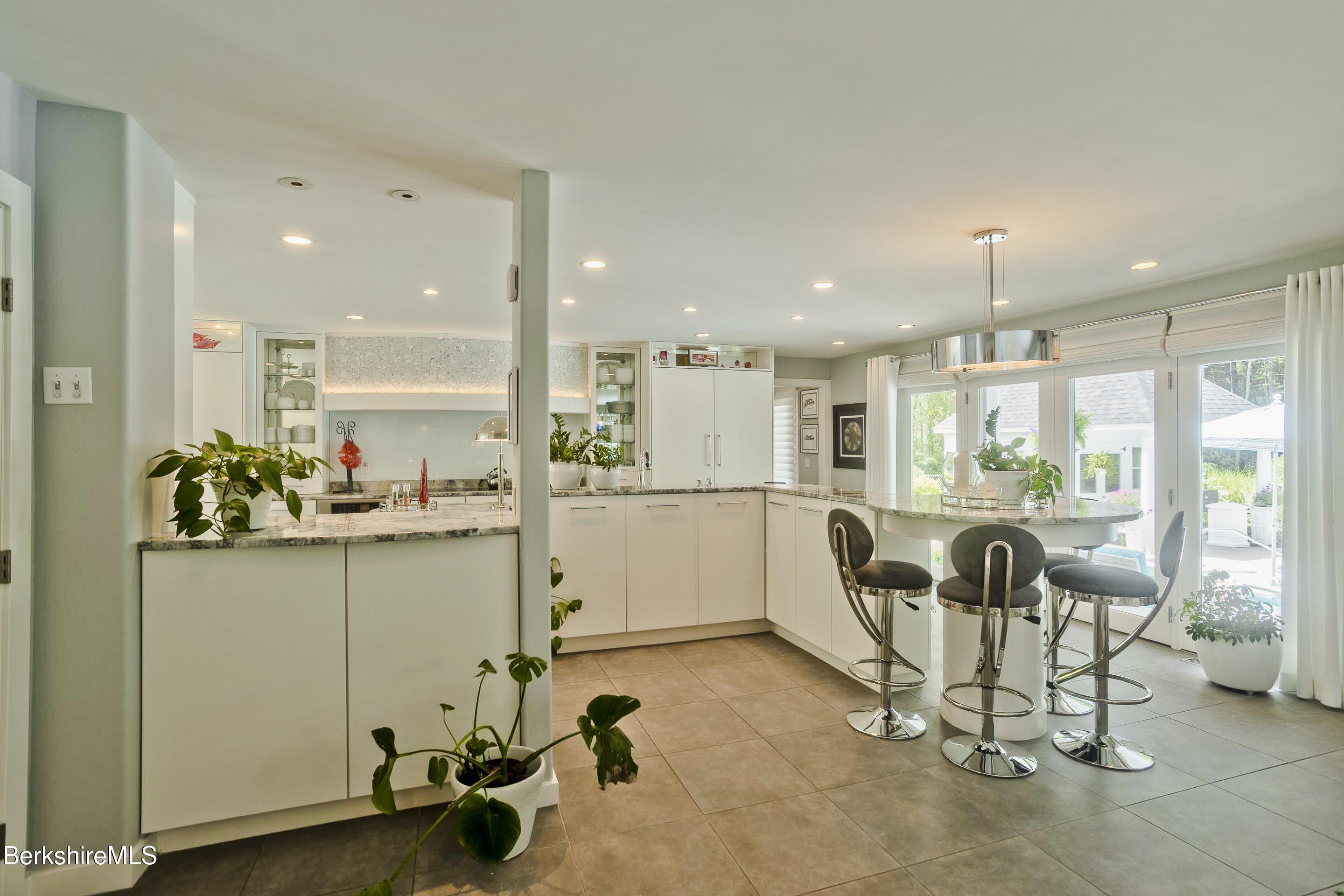 183 Loomis Ridge Road Westfield, MA 01085 - Photo 16 of 39 a room with stainless steel appliances kitchen island granite countertop furniture and a view of living room