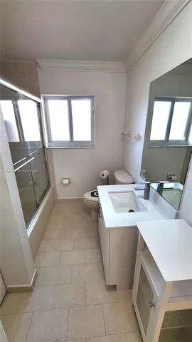 a view of utility room and sink