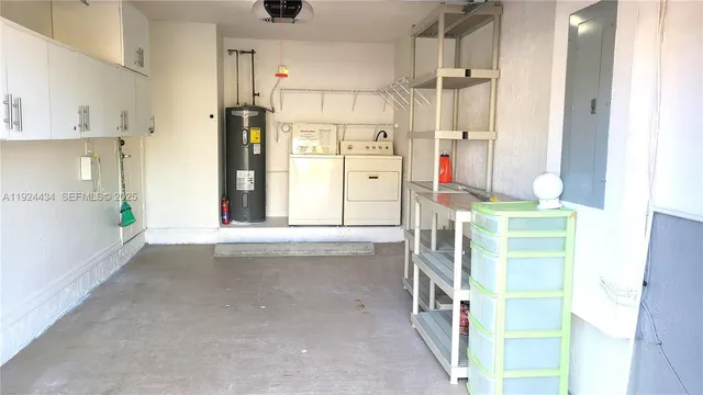 a view of swimming pool with a lawn chairs under an umbrella