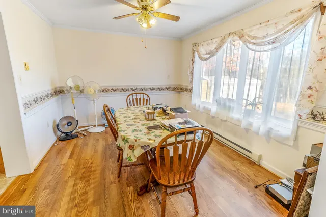 a view of a living room and entryway
