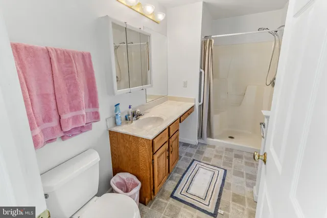 a living room with furniture and a white door