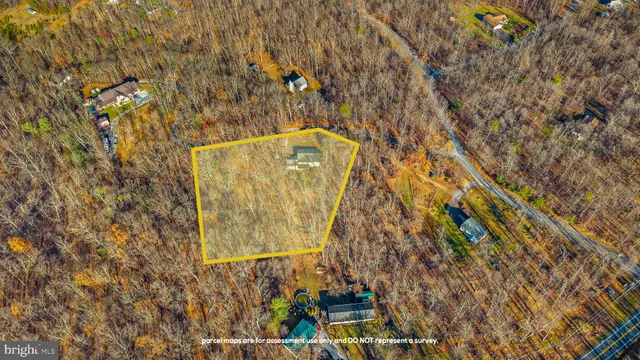 a view of a kitchen with sink stove and refrigerator