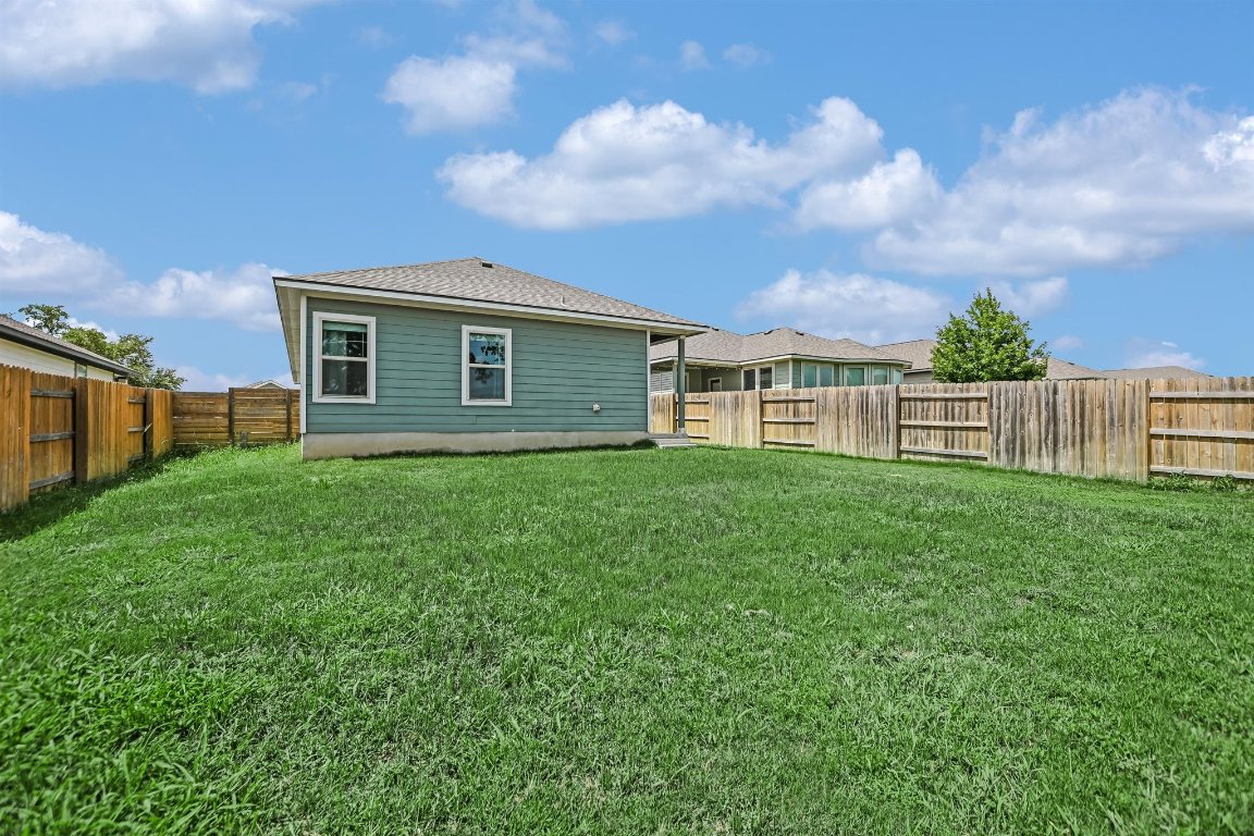 124 Ancellotta Way Leander, TX 78641 - Photo 20 of 20 Back of property with a fenced backyard