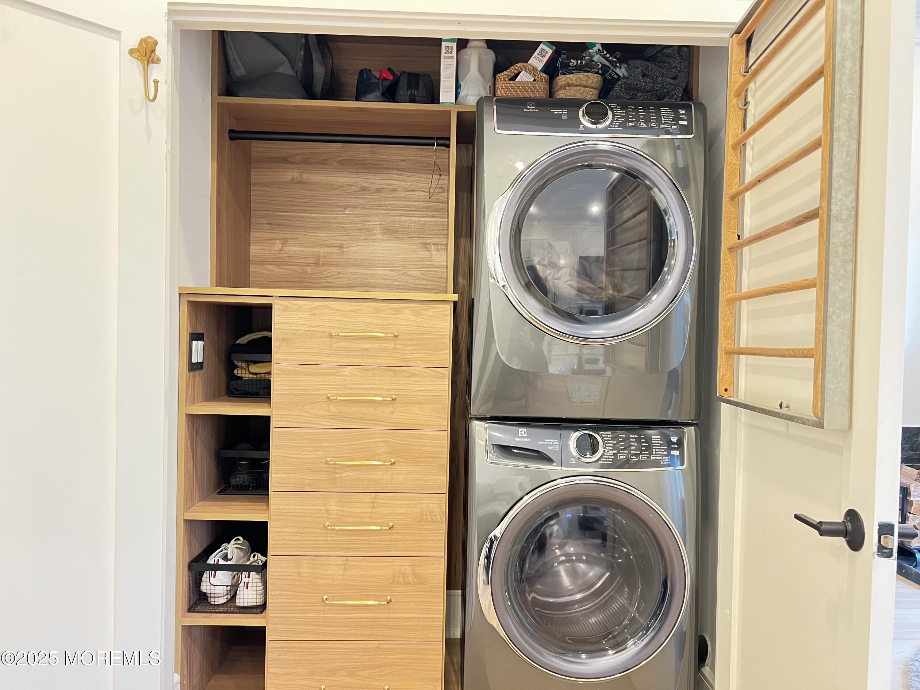 164 Glenwood Avenue, Unit 201 Bloomfield, NJ 07003 - Photo 15 of 26 a utility room with dryer and washer