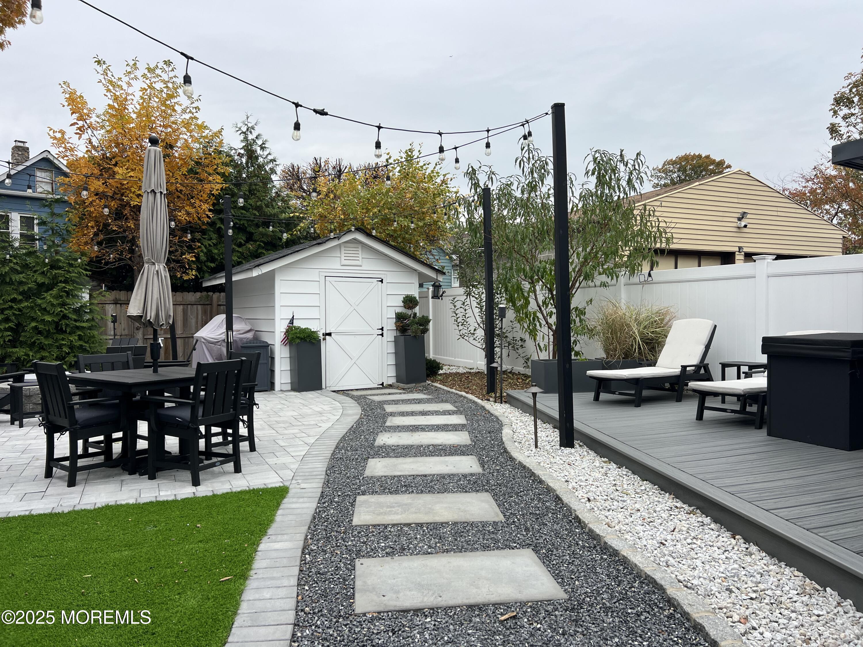 164 Glenwood Avenue, Unit 201 Bloomfield, NJ 07003 - Photo 22 of 26 a view of outdoor space yard deck patio and outdoor seating