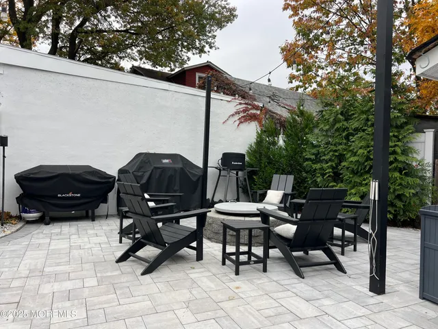 a view of a lounge chairs in the patio