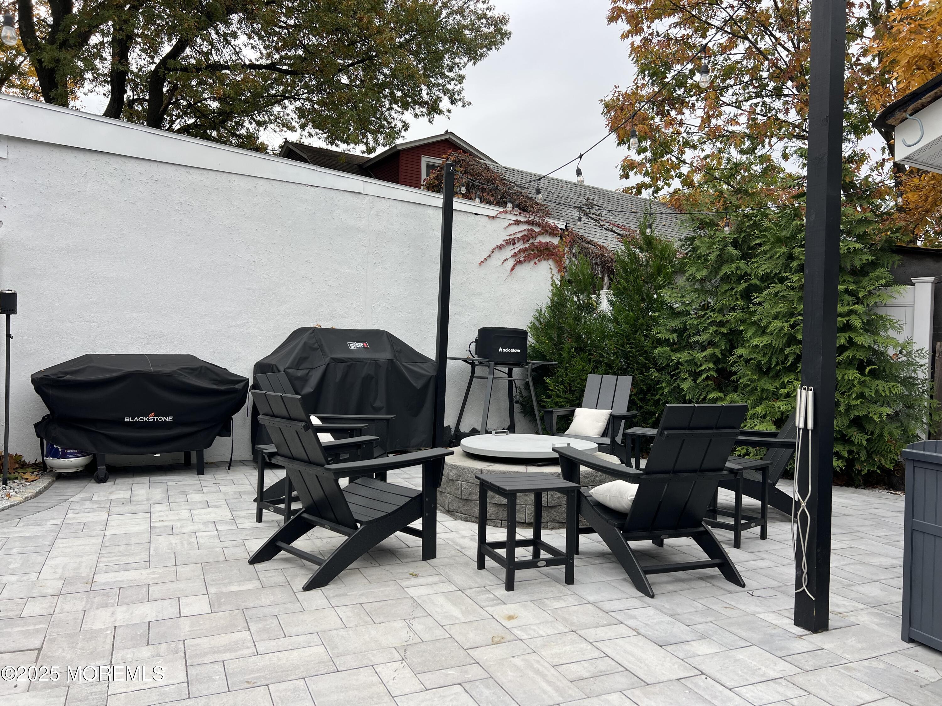 164 Glenwood Avenue, Unit 201 Bloomfield, NJ 07003 - Photo 23 of 26 a view of a lounge chairs in the patio