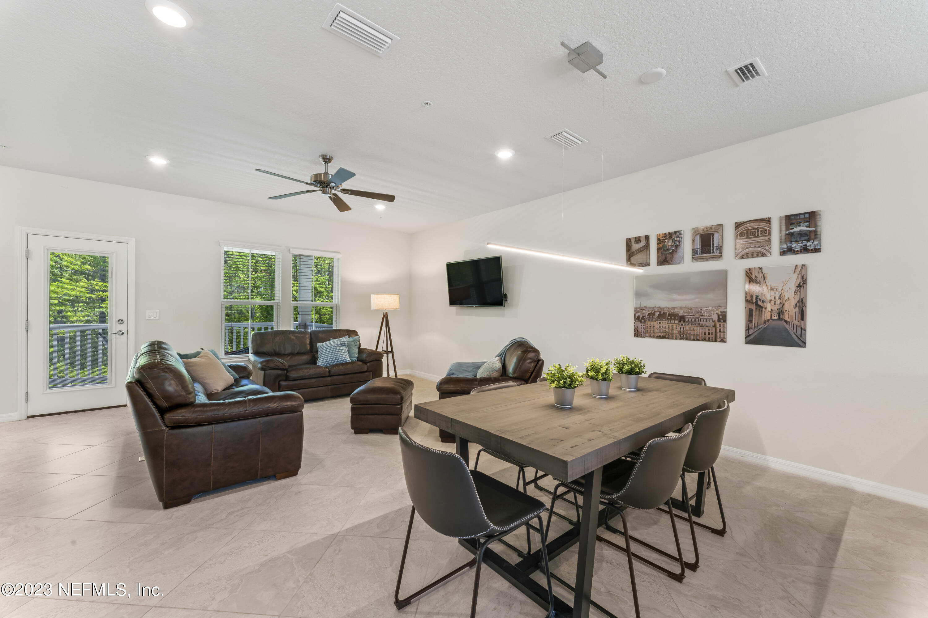 55 Spring Tide Way Ponte Vedra, FL 32081 - Photo 19 of 75 a living room with furniture and a flat screen tv