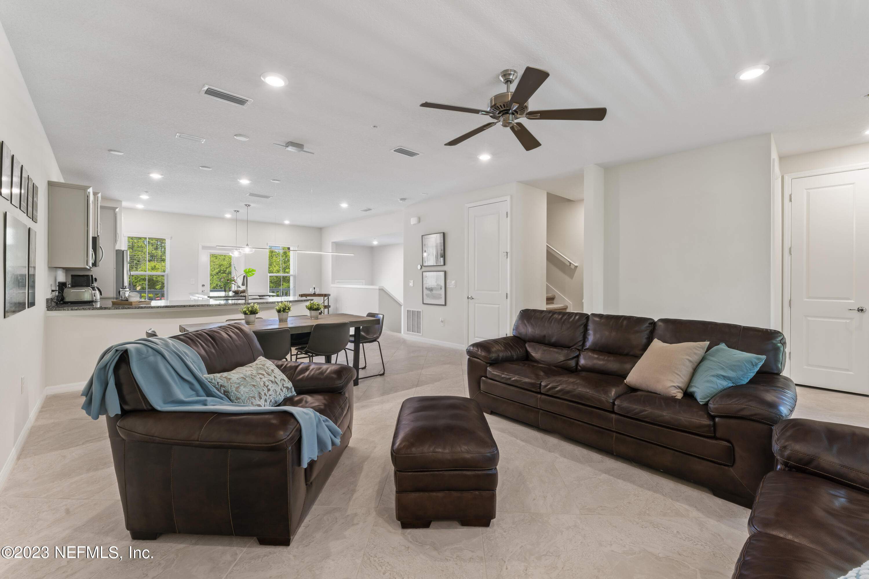 55 Spring Tide Way Ponte Vedra, FL 32081 - Photo 20 of 75 a living room with furniture and a large window