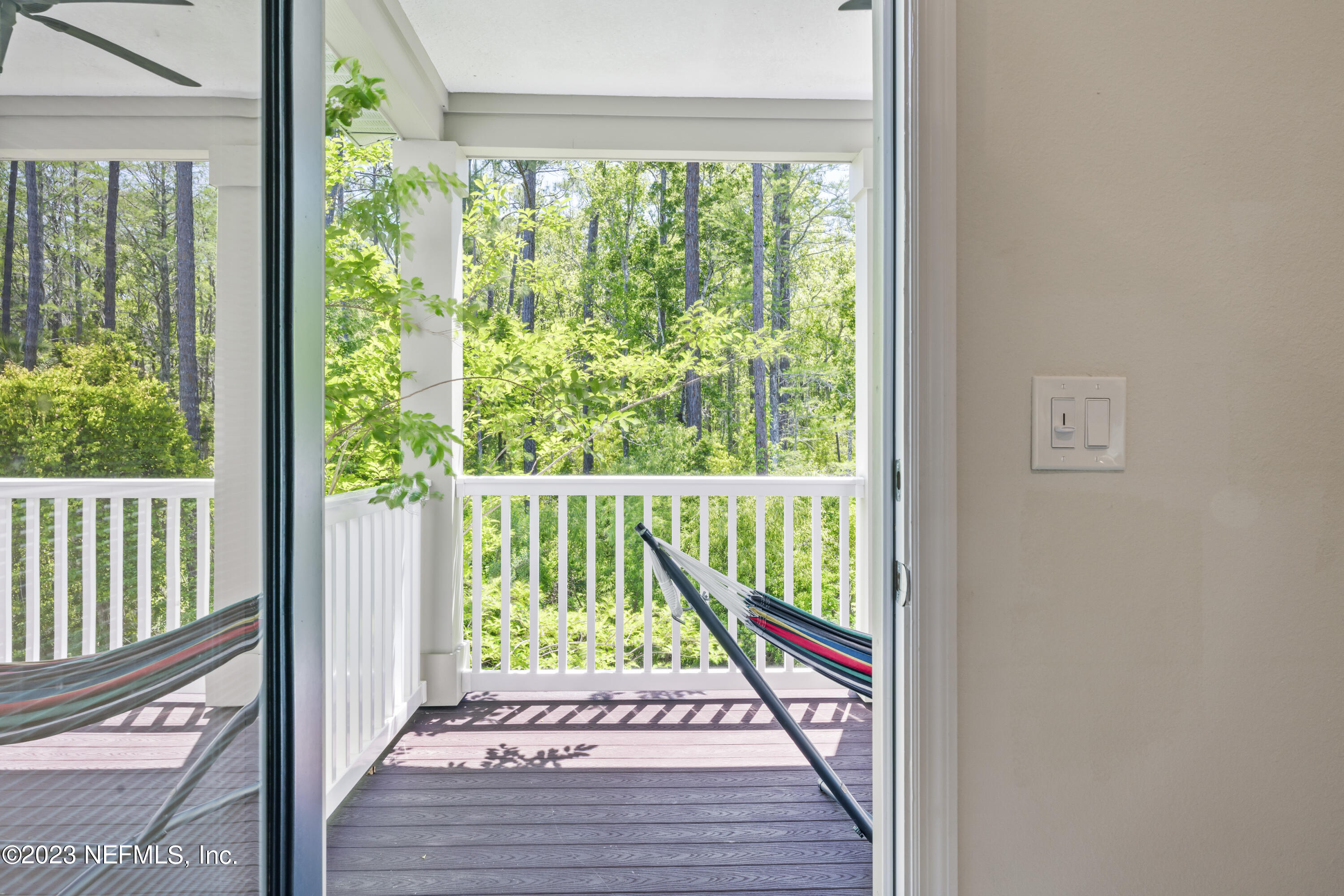 55 Spring Tide Way Ponte Vedra, FL 32081 - Photo 24 of 75 a view of an empty room with wooden floor and a window