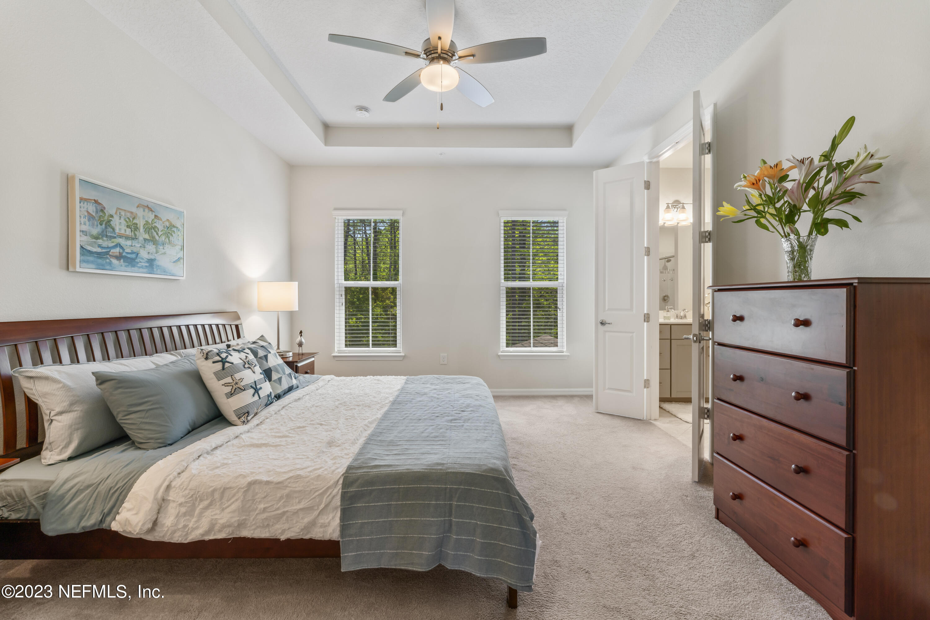 55 Spring Tide Way Ponte Vedra, FL 32081 - Photo 29 of 75 a bedroom with a bed and window