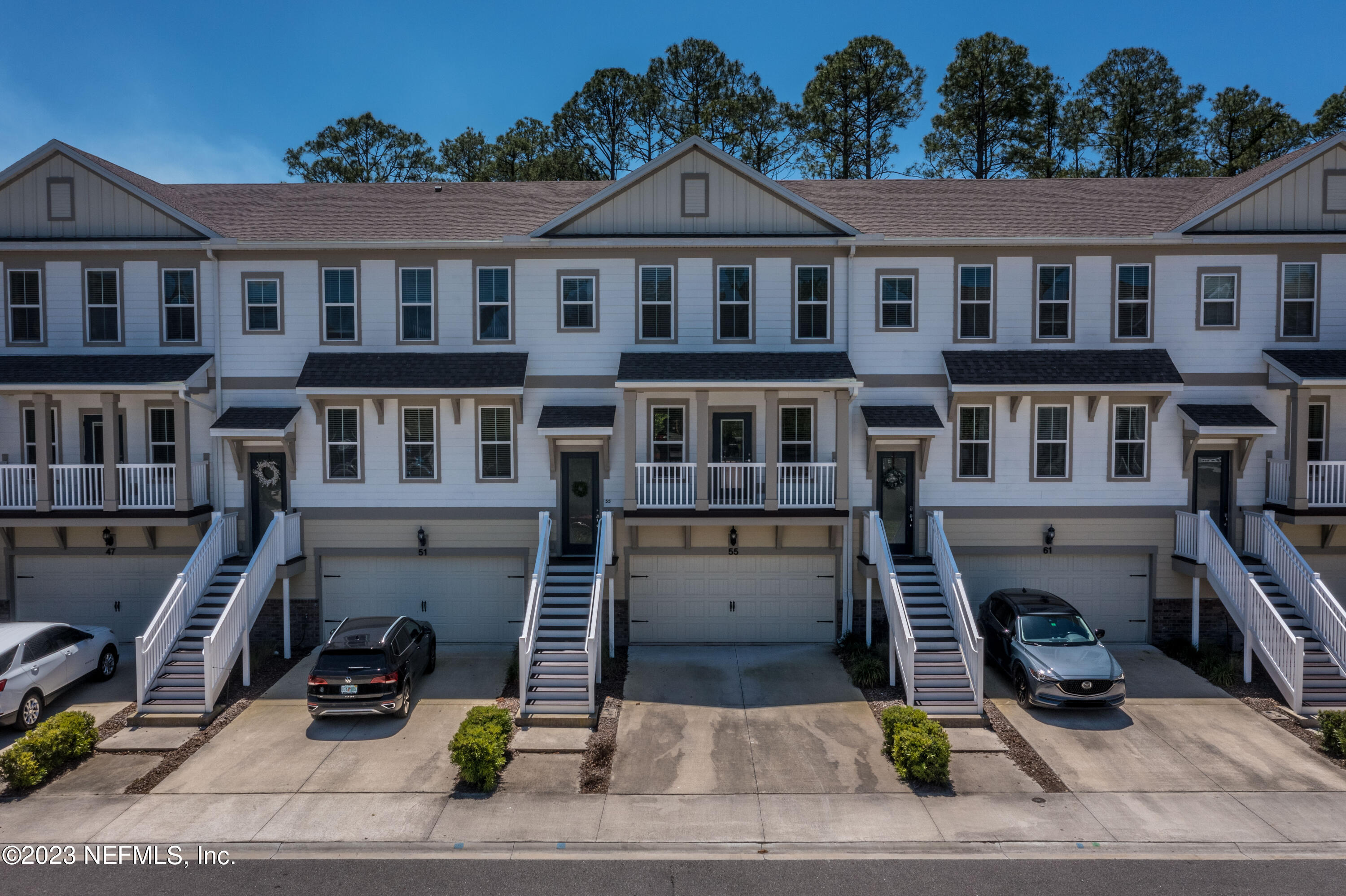 55 Spring Tide Way Ponte Vedra, FL 32081 - Photo 3 of 75 a front view of a building with street