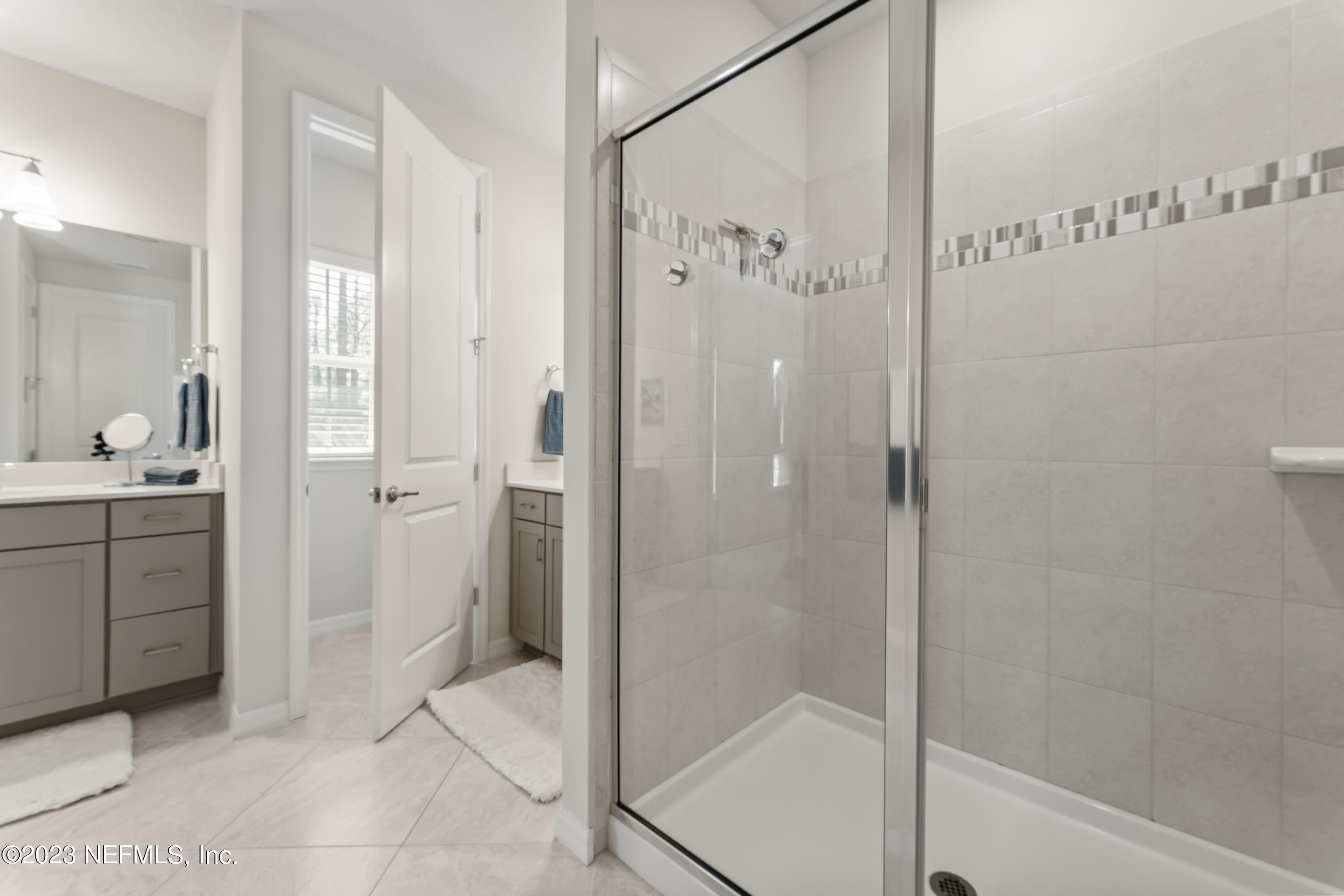 55 Spring Tide Way Ponte Vedra, FL 32081 - Photo 33 of 75 a bathroom with a shower and a sink