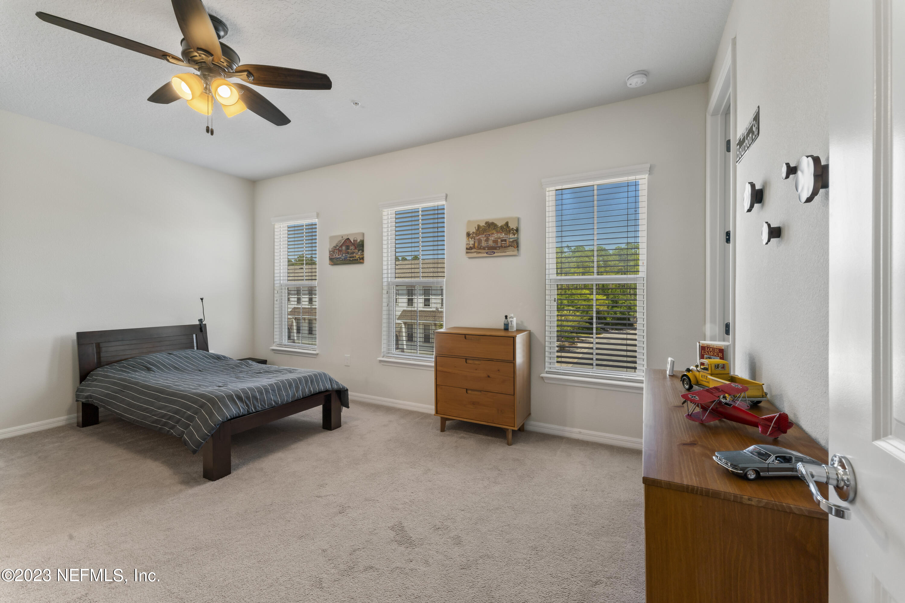 55 Spring Tide Way Ponte Vedra, FL 32081 - Photo 36 of 75 a living room with furniture and a window