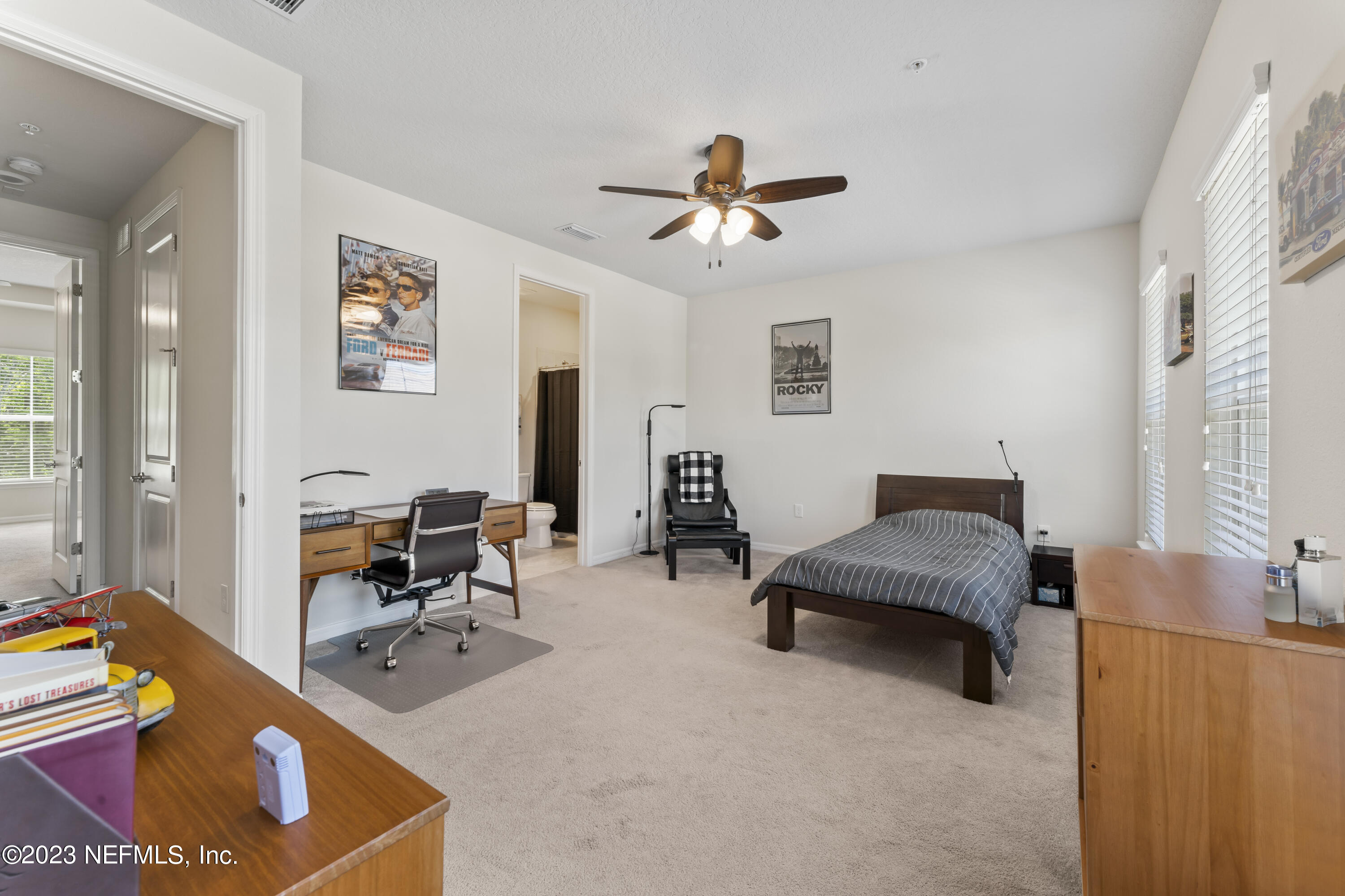 55 Spring Tide Way Ponte Vedra, FL 32081 - Photo 38 of 75 a living room with furniture and a flat screen tv
