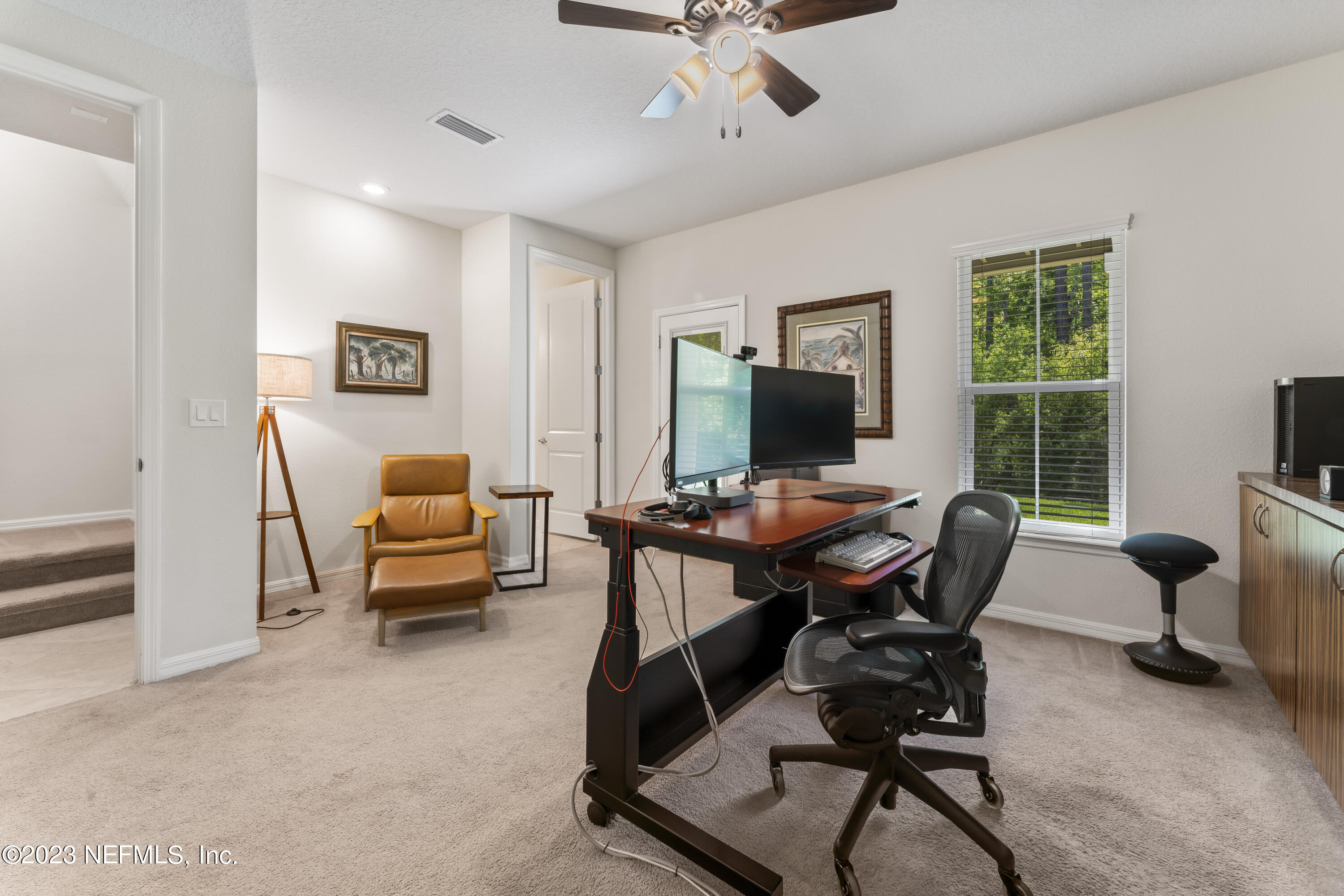 55 Spring Tide Way Ponte Vedra, FL 32081 - Photo 42 of 75 a view of a livingroom with workspace and a window