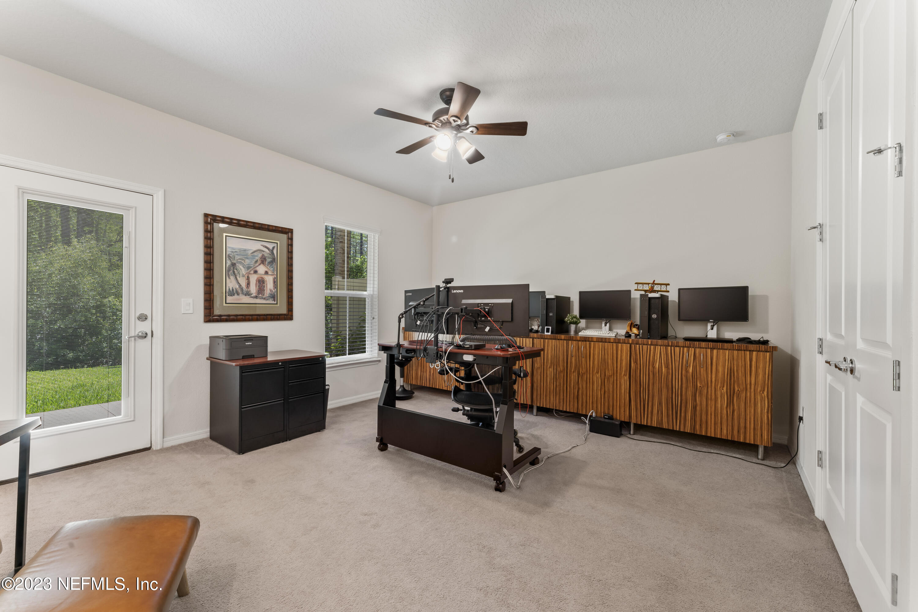 55 Spring Tide Way Ponte Vedra, FL 32081 - Photo 44 of 75 a bedroom with furniture and a window