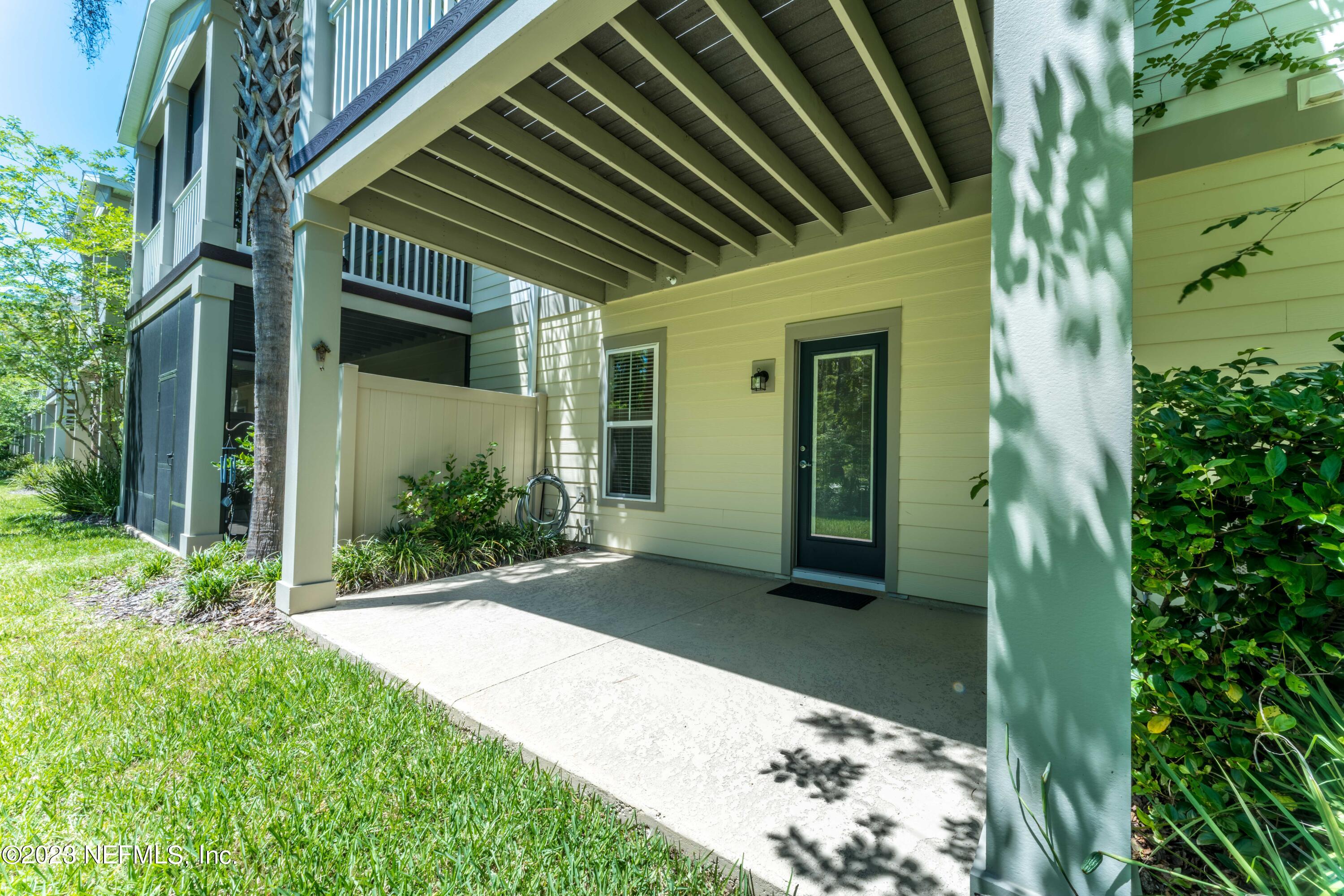 55 Spring Tide Way Ponte Vedra, FL 32081 - Photo 47 of 75 a view of a back yard of the house
