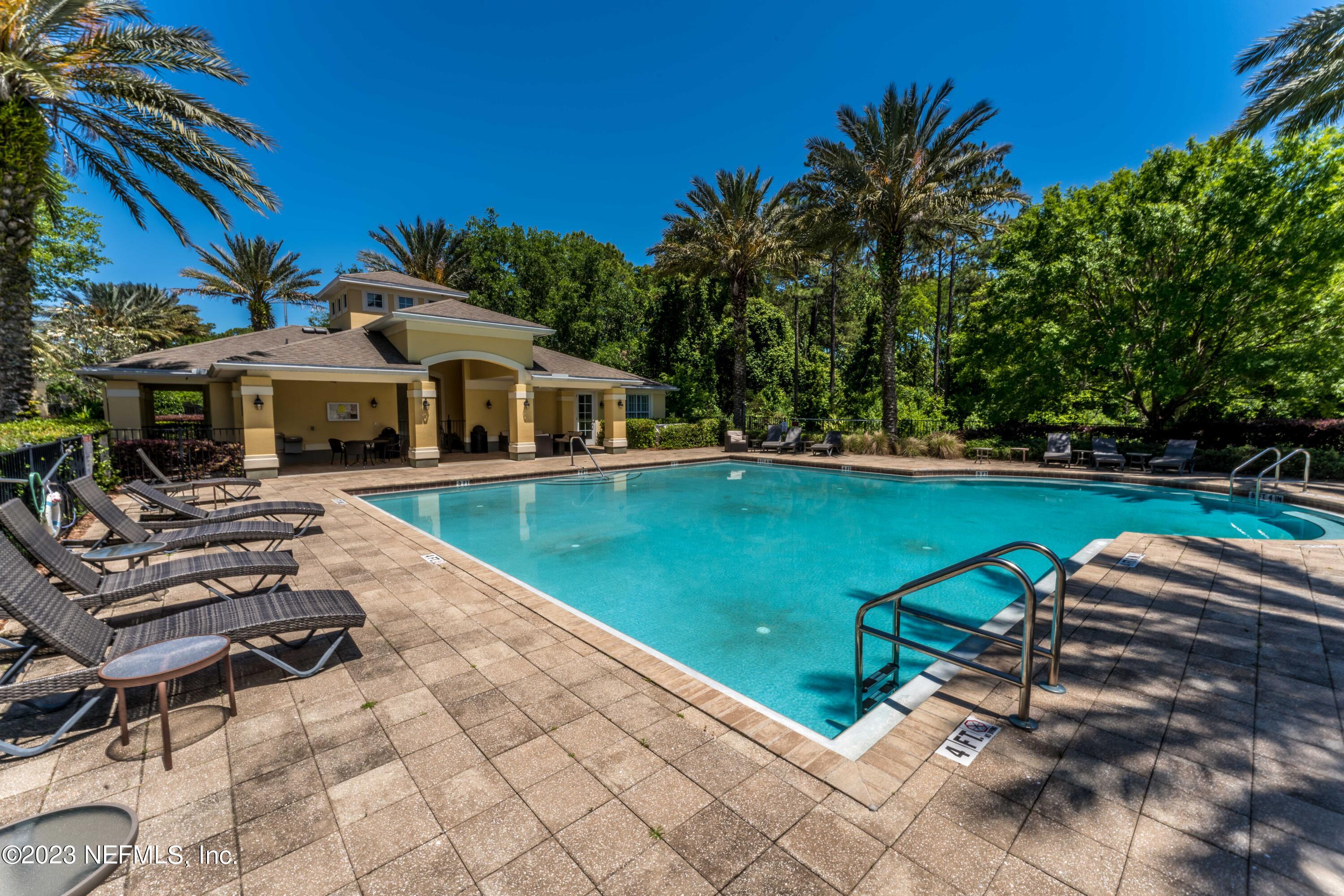 55 Spring Tide Way Ponte Vedra, FL 32081 - Photo 71 of 75 a view of a yard with chairs