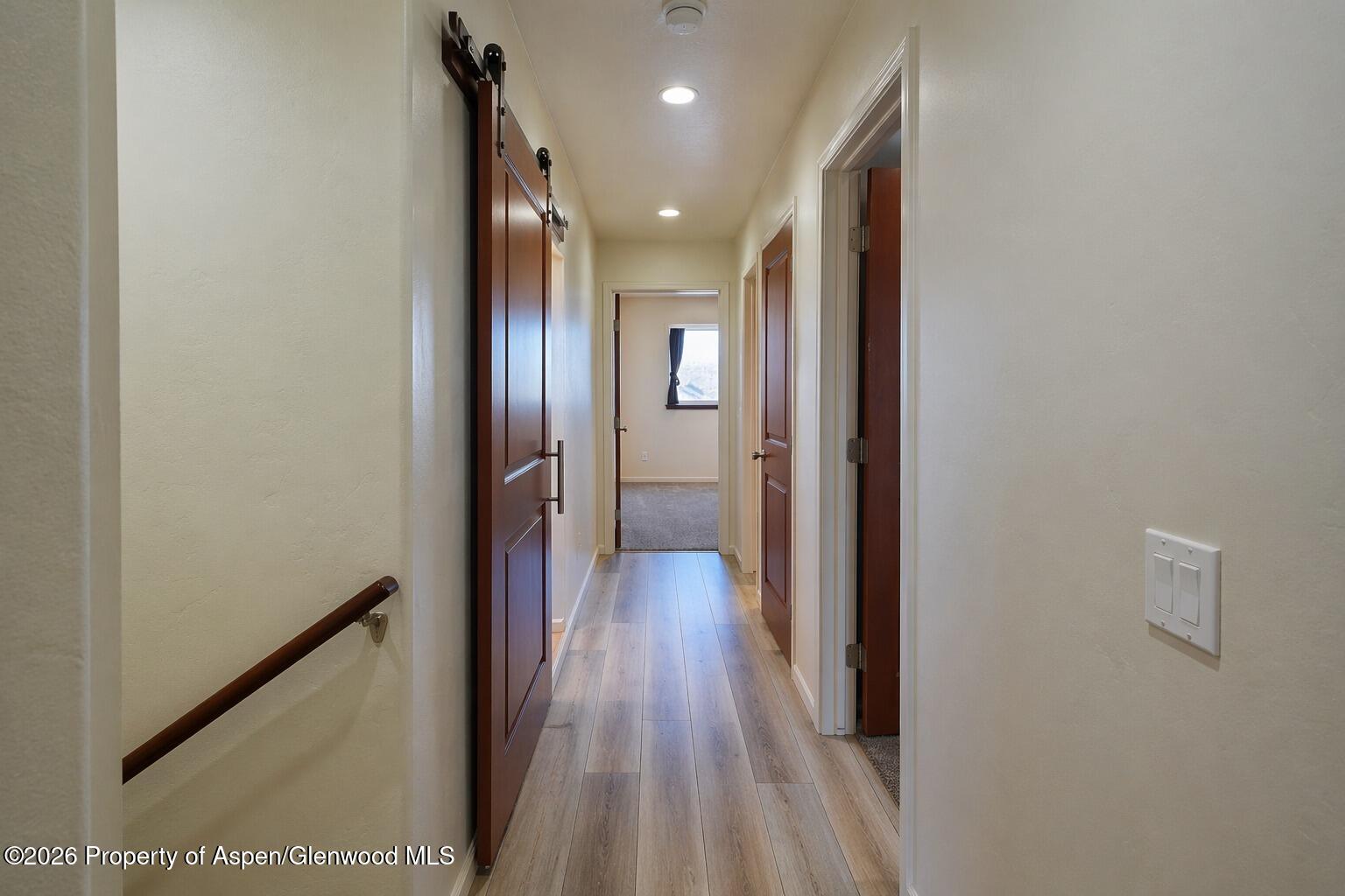 1648 Arabian Avenue Rifle, CO 81650 - Photo 8 of 15 a view of hallway with wooden floor